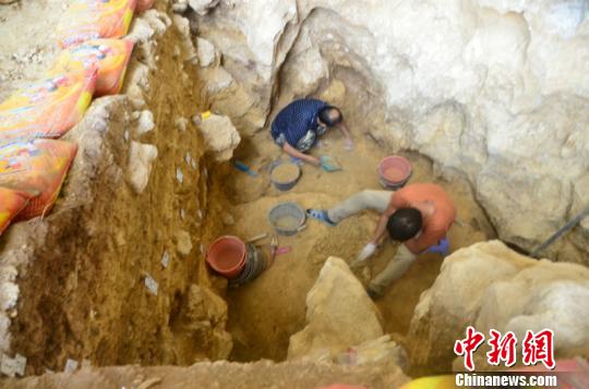 广西发现1.6万年前人类头骨化石出土石制品万余件
