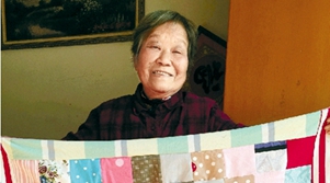 杭州西湖区“被单奶奶”6年做了近700条爱心被